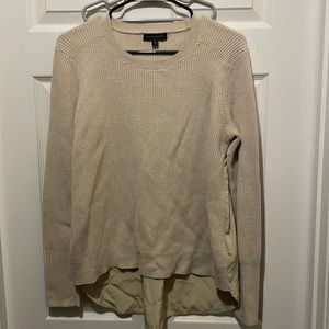 Cream colored sweater with dress shirt back